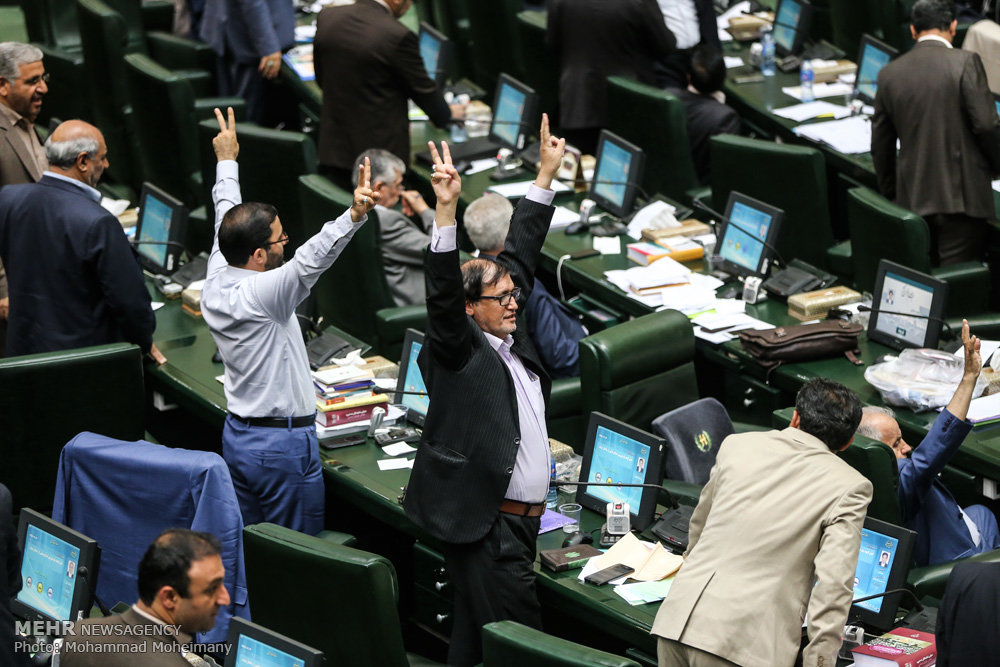 Iranian parliament opposes dividing up three ministries