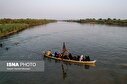 تصاویر/ گذر زائران اربعین حسینی از رودخانه دز