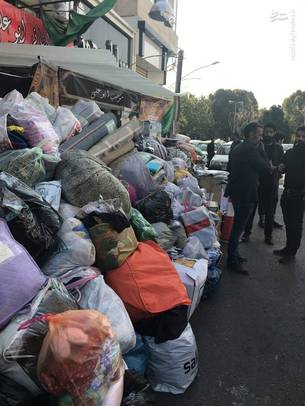 جمع اوری کمک به مردم زلزله زده کرمانشاه توسط کسبه و بازاریان