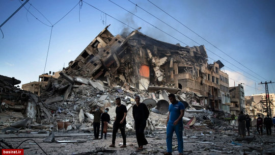 خرابی های ناشی از  اصابت بمب های رژیم صهیونیستی به یک ساختمان 15 طبقه در نوار غزه  